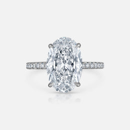 Oval-Cut Engagement Ring in Modern Pave Setting With Bridge