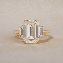 Gold Three-Stone Emerald-Cut Engagement Ring