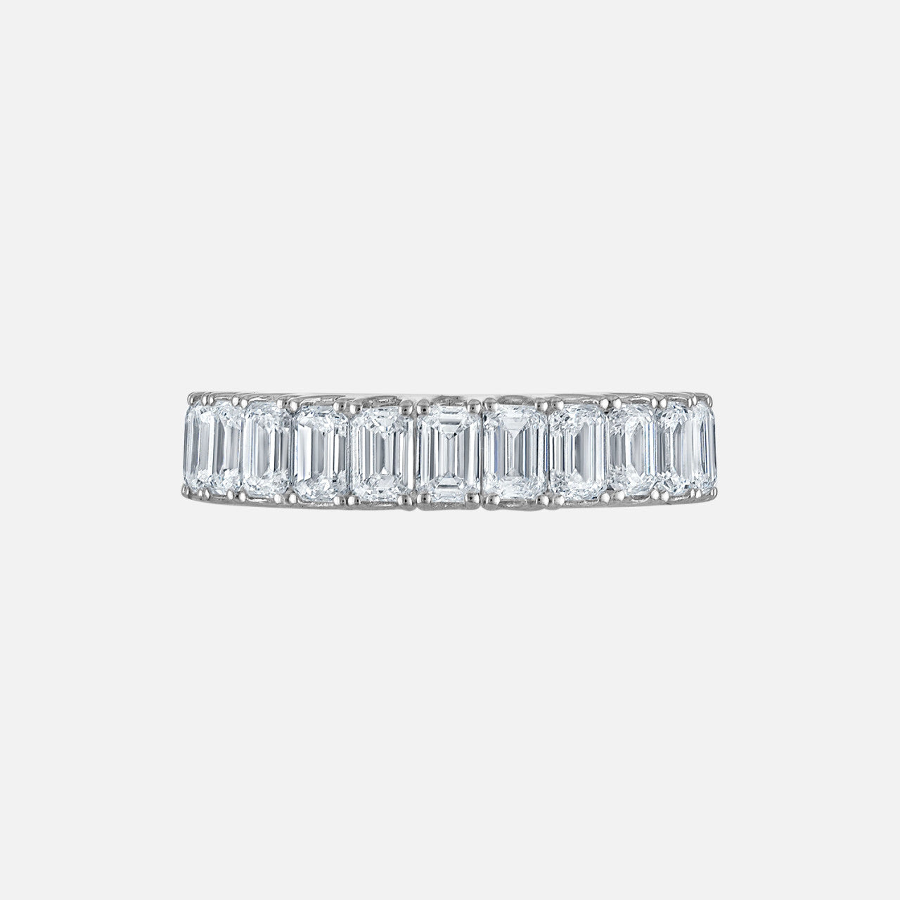 emerald cut diamond stretch eternity band set in white gold