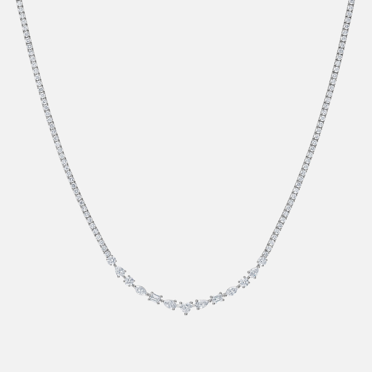 diamond tennis necklace with mixed shaped diamonds in the center surrounded by round diamonds