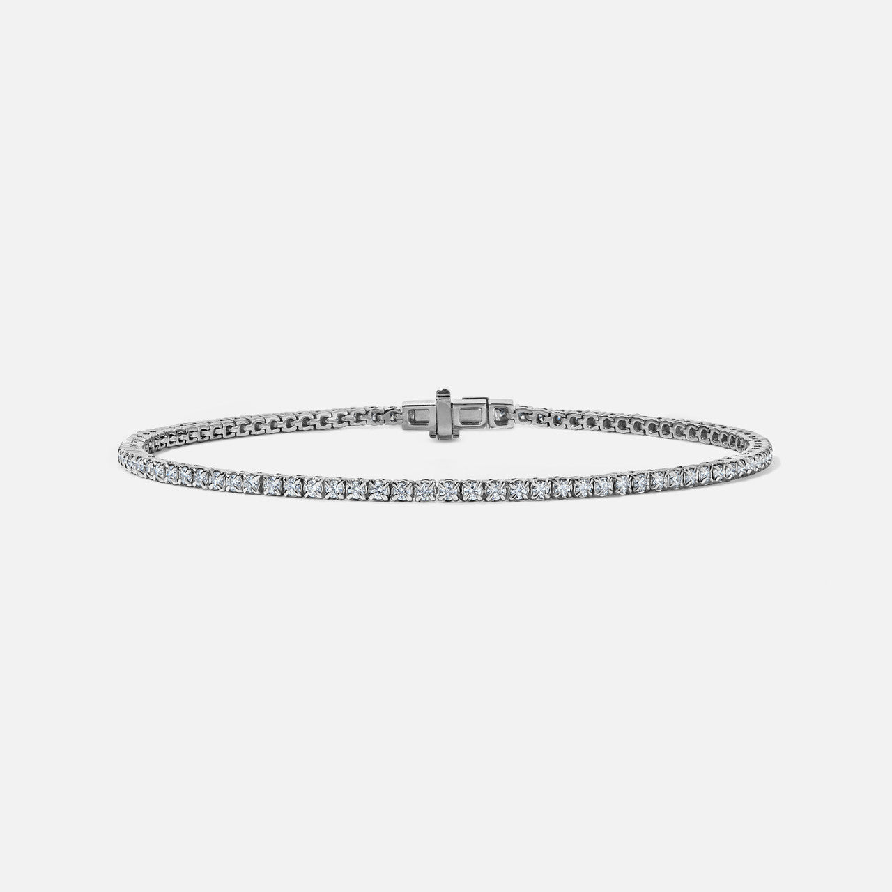 Refined diamond tennis bracelet, prong set in white gold