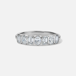 Bezel-Set Emerald and Oval Diamond Ring