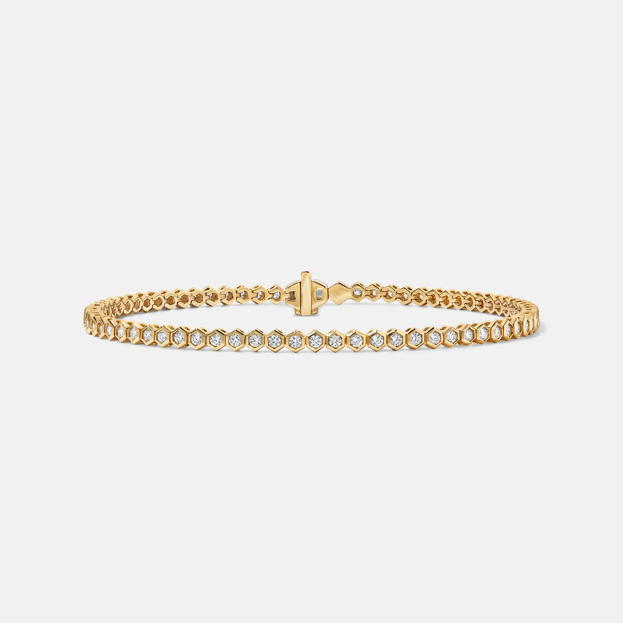Refined diamond tennis bracelet with honeycomb settings, in yellow gold