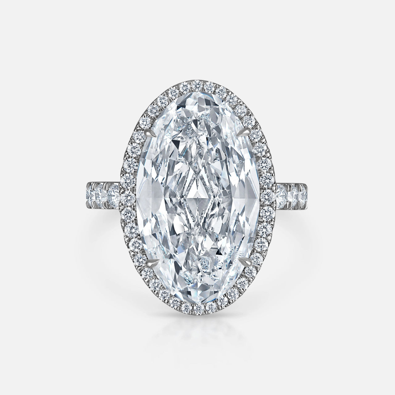 7.03-carat oval diamond engagement ring in a halo pave setting in platinum