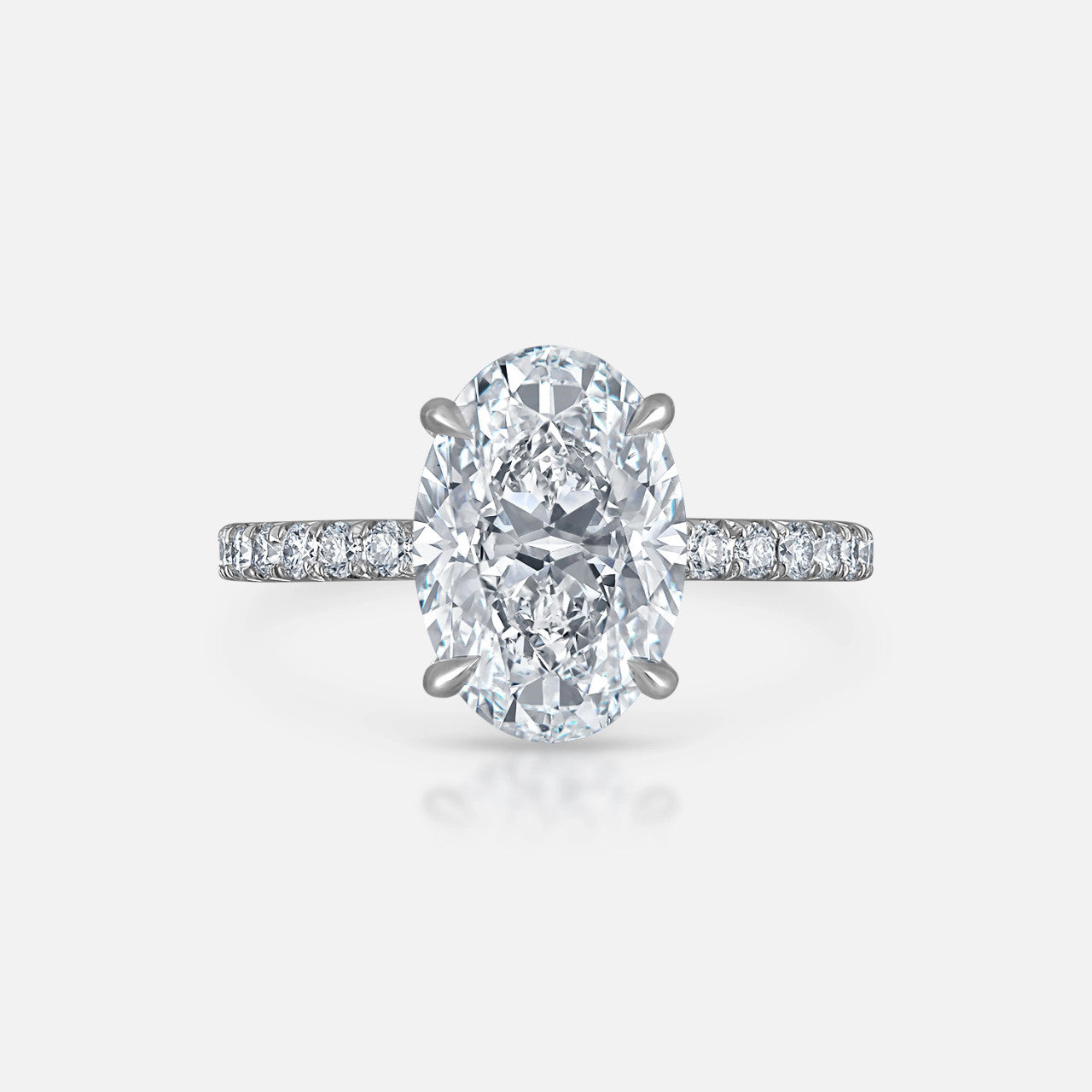 3.03 carat D/VS2 Oval Natural Diamond engagement ring set in a Modern Pave setting from Razny Jewelers.
