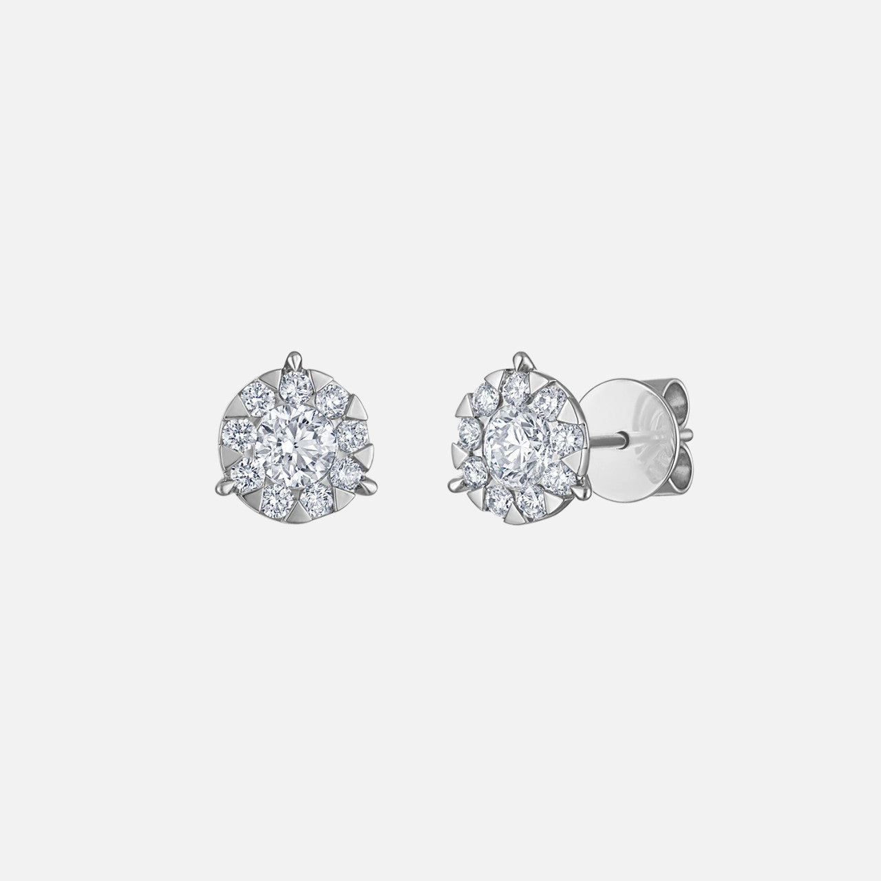 Center stones surrounded by nine smaller natural diamonds create a bouquet design in these medium-sized diamond stud earrings. Set in white gold.