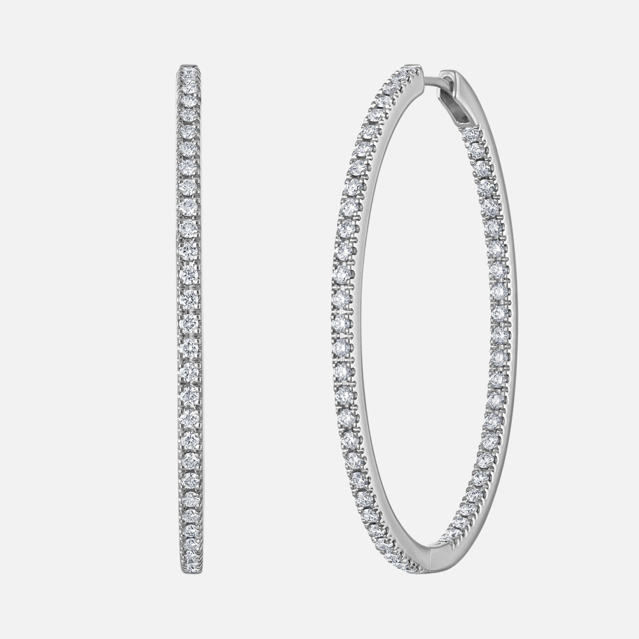 Mémoire Large Pave Oval Diamond Hoops from Razny Jewelers