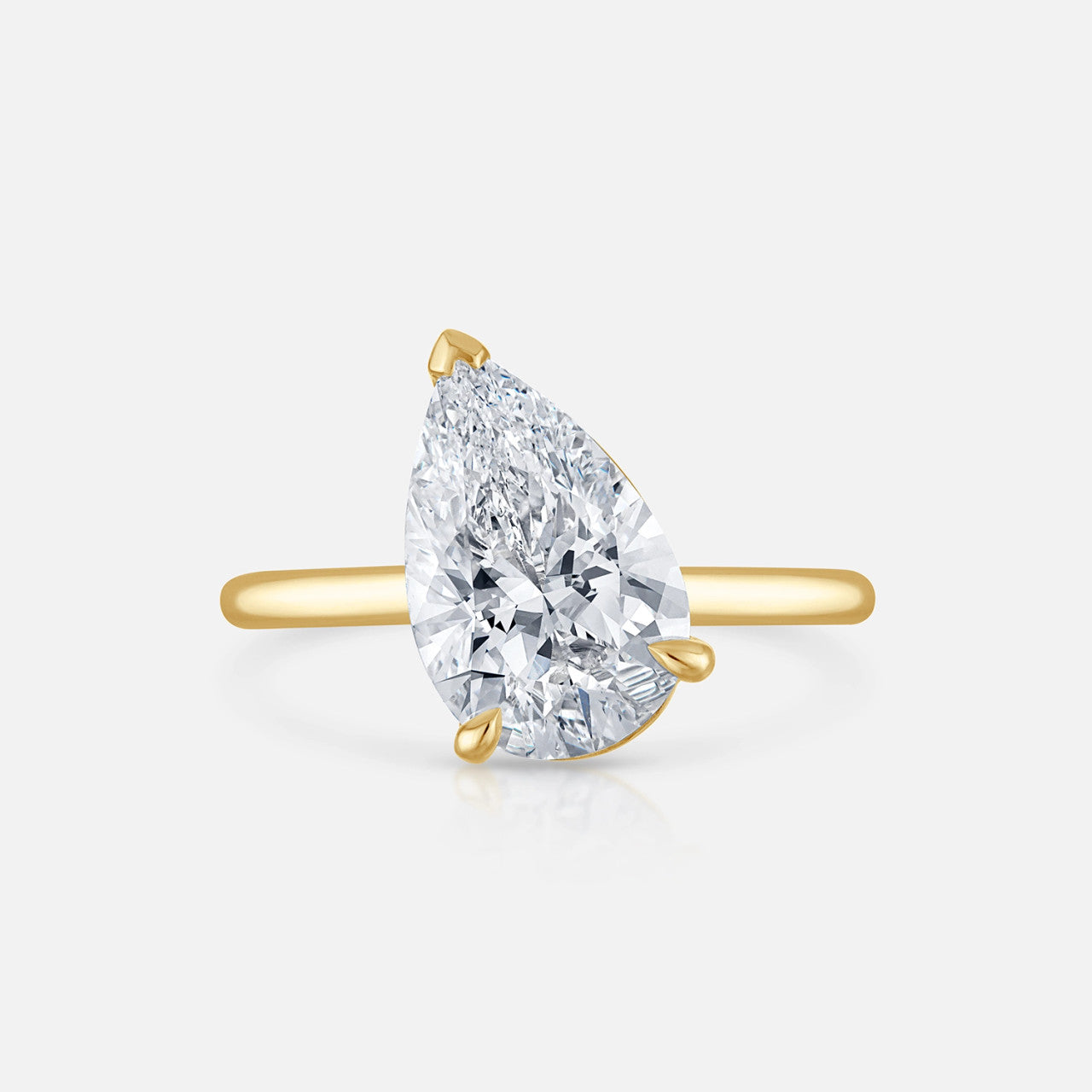 pear-shaped natural diamond solitaire engagement ring