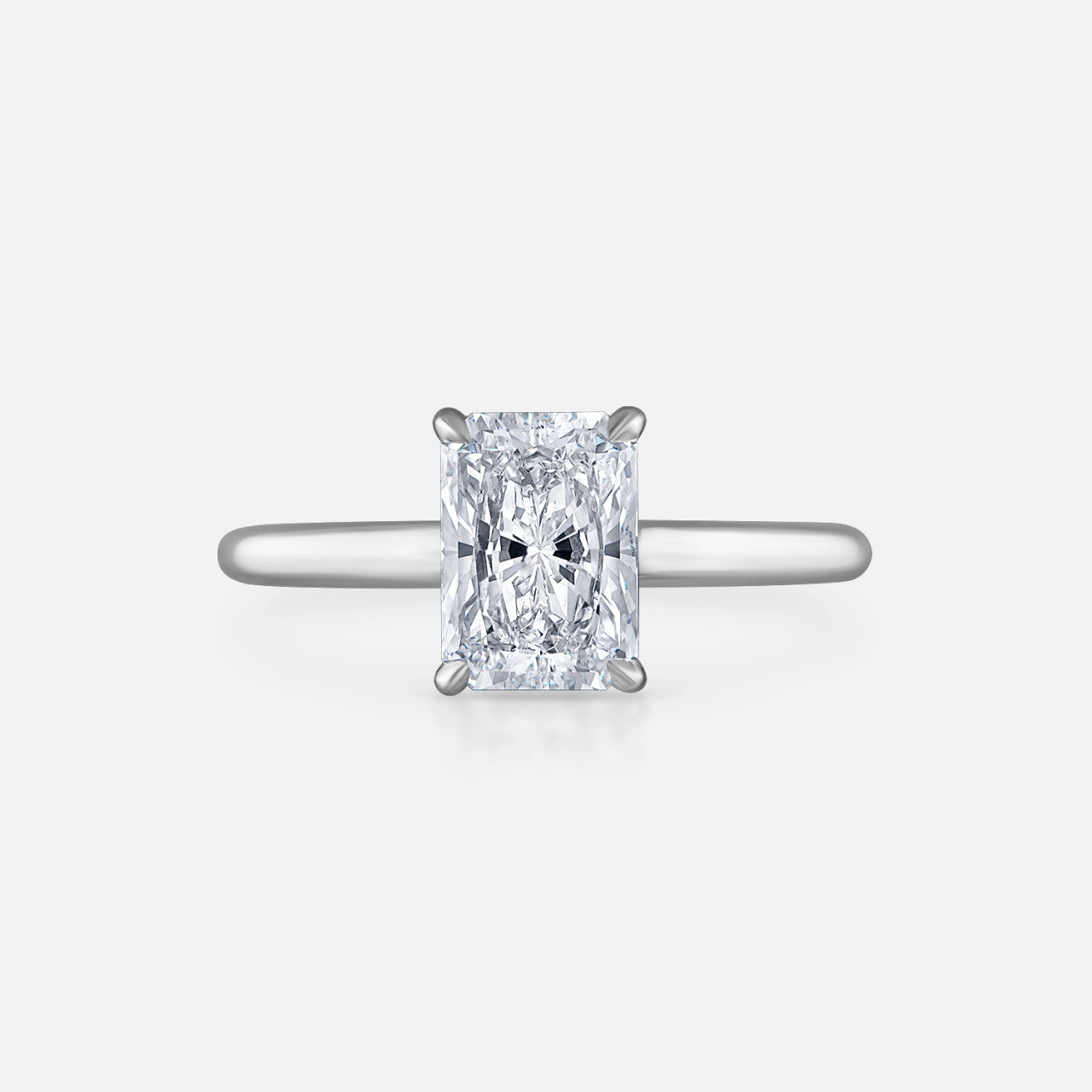 Radiant-cut solitaire diamond engagement ring, in 18k white gold