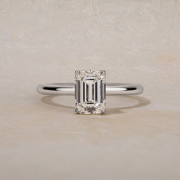 Platinum Emerald Diamond Hidden Halo Ring