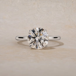 Platinum Hidden Halo and Round Diamond Ring