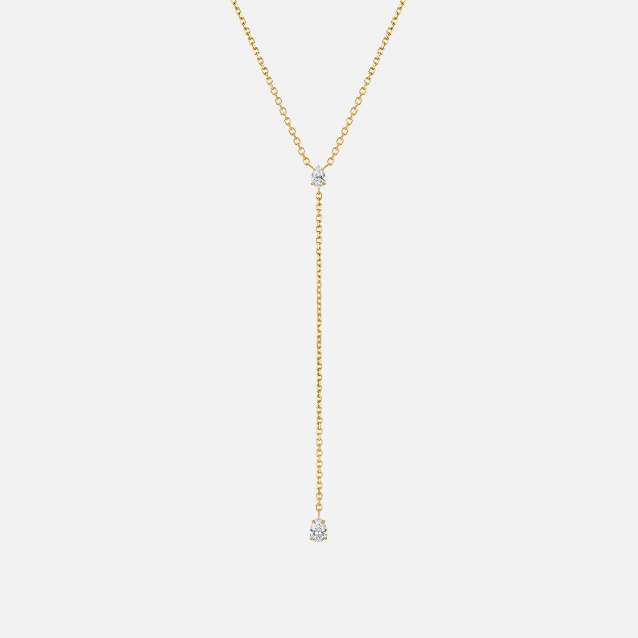 This Refined by Razny necklace features a delicate lariat silhouette, with a pear-shaped diamond in the center and a pear-shaped diamond droplet.