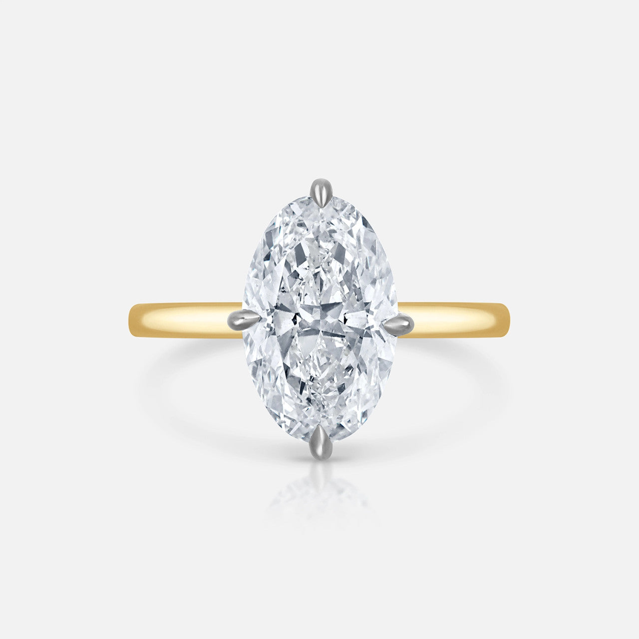 3.01 carat I/SI1 Oval Natural Diamond set in our Signature Solitaire from Razny Jewelers