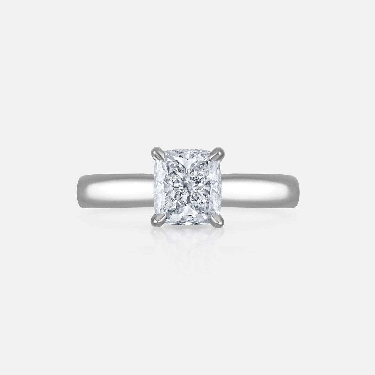 Cushion-cut diamond solitaire engagement ring, available at Razny Jewelers