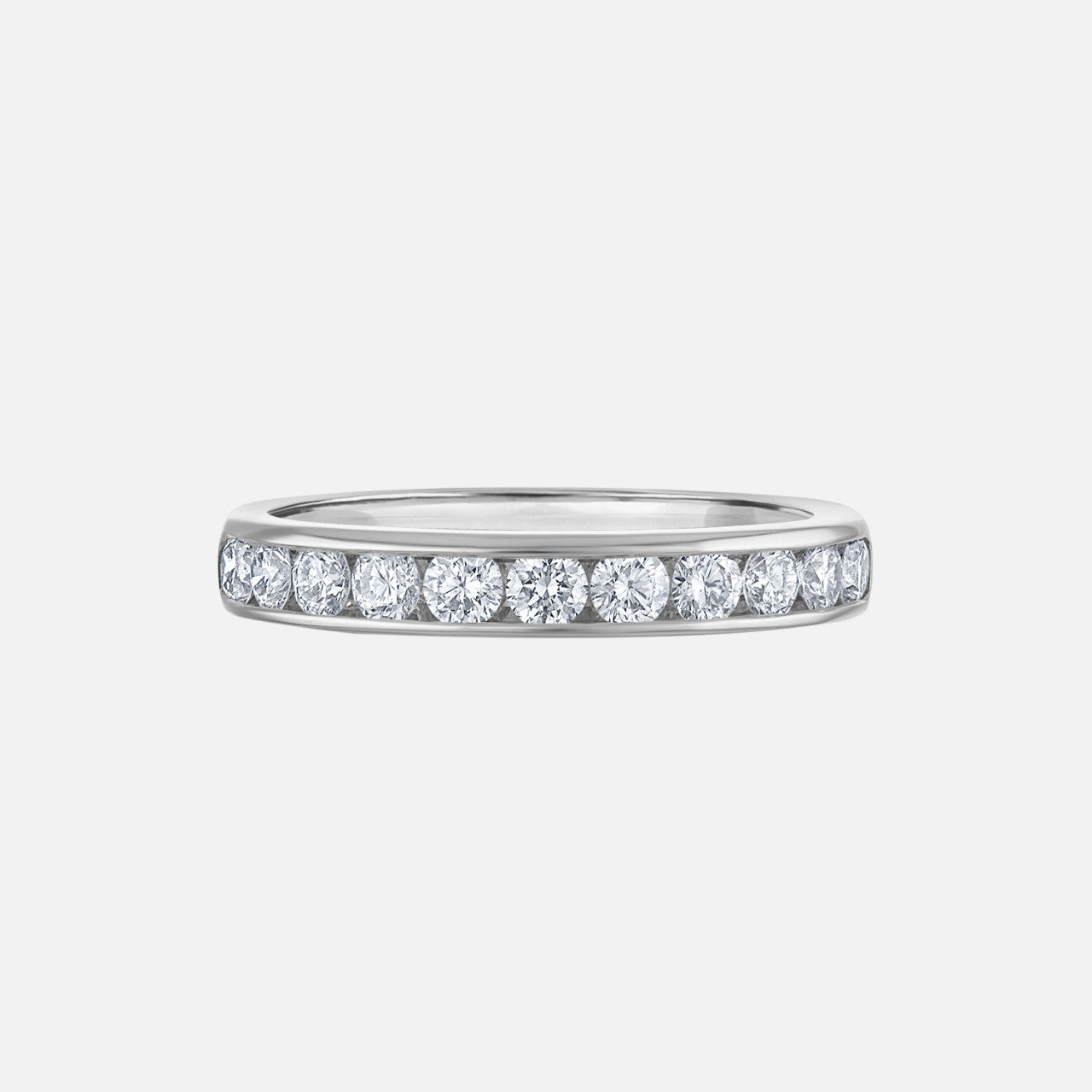 white gold wedding band, channel set with 11 round diamonds