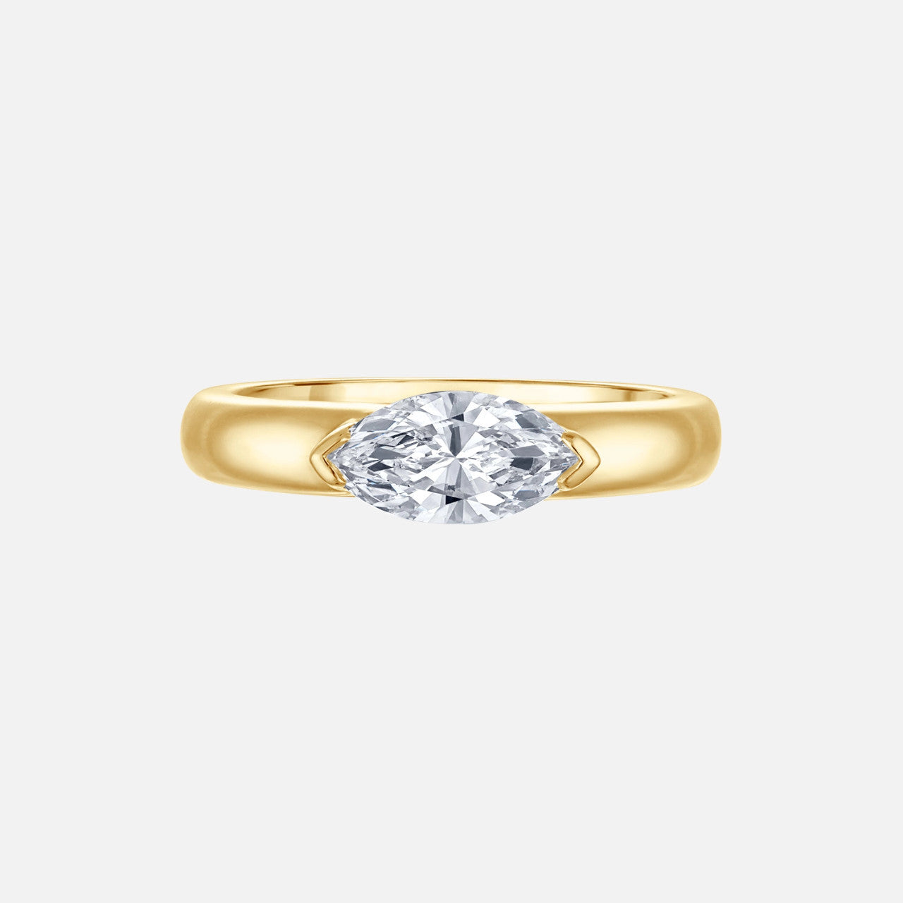 Refined marquise diamond pinky ring in yellow gold