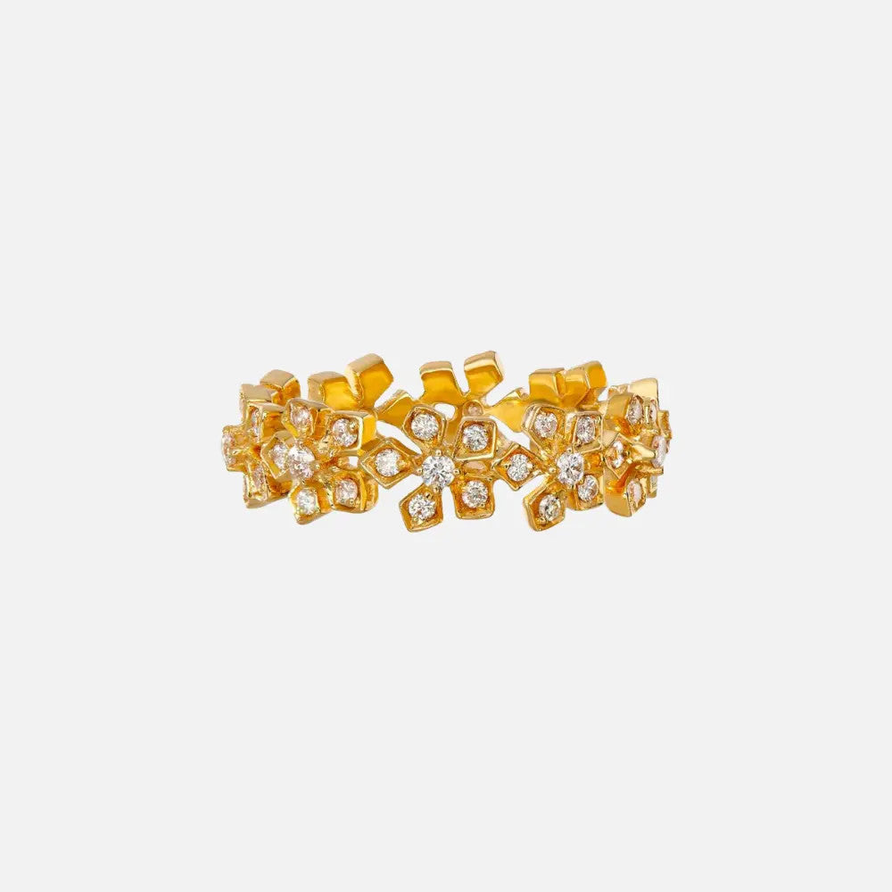 Sethi Couture Enchanted Garden Yellow Gold and Diamond Band at Razny Jewelers. This yellow gold band features a flower motif set with round natural diamonds for feminine touch to any stack.