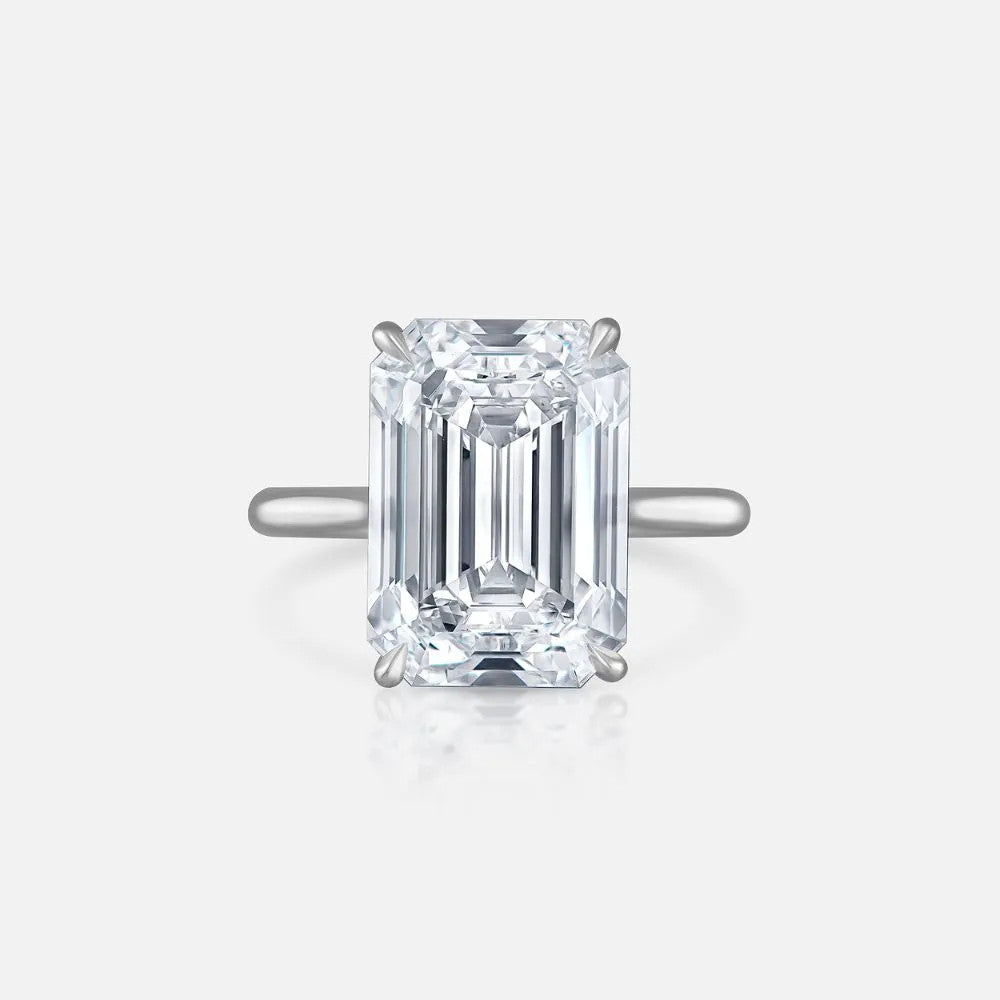 This engagement ring features a 8.98-carat emerald-cut natural diamond set in a platinum semi-mount (sold separately).