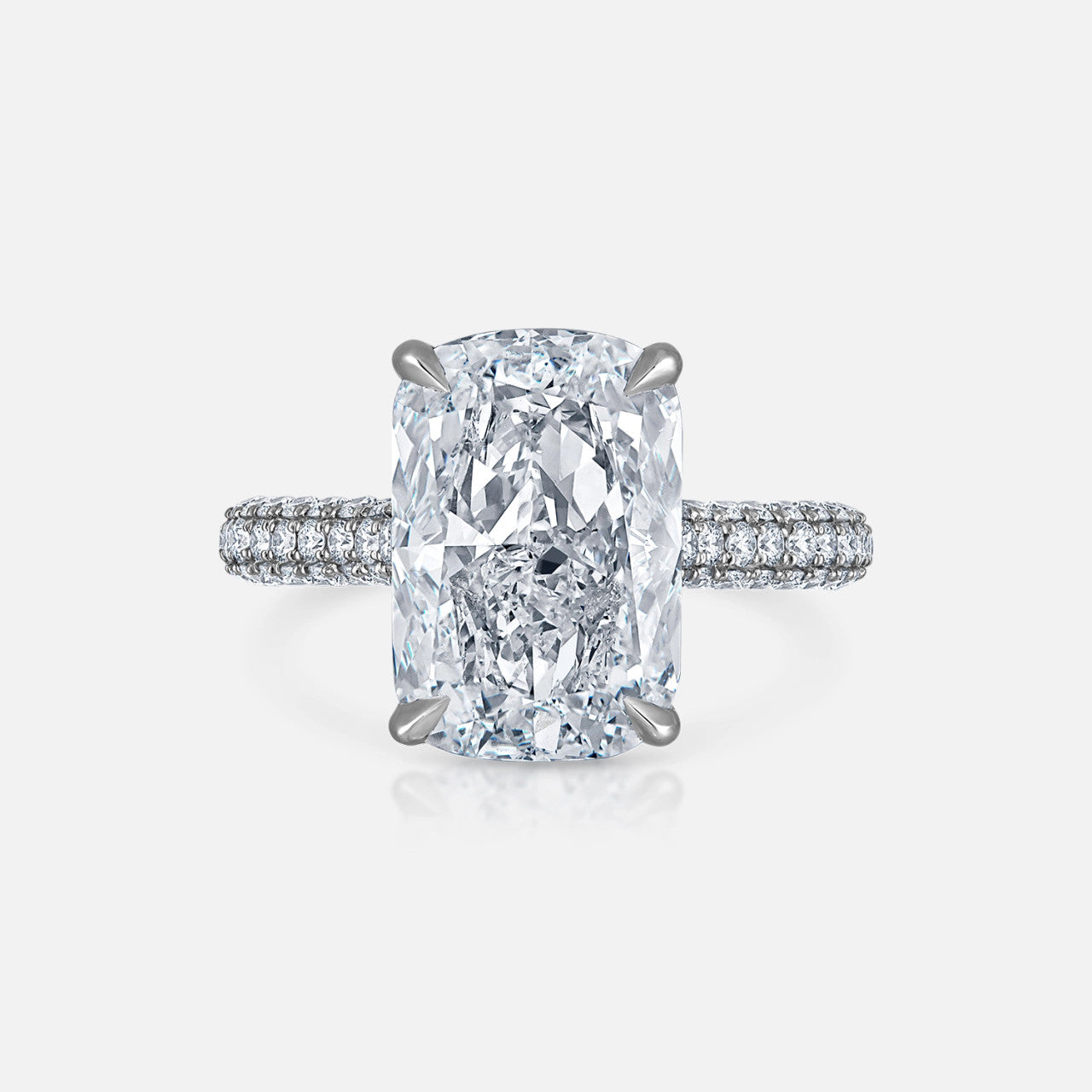 Cushion cut diamond engagement ring in a modern pave setting