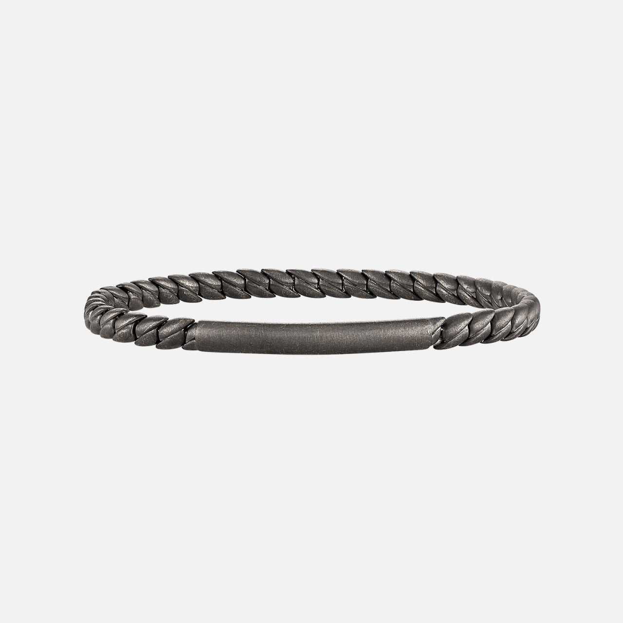 Hulchi Belluni Tresore ID Bar Braided Stretch Bracelet: This 18K black rhodium men’s stretch bracelet features a braided design with a sleek ID bar for a bold, modern statement. Available at Razny Jewelers.