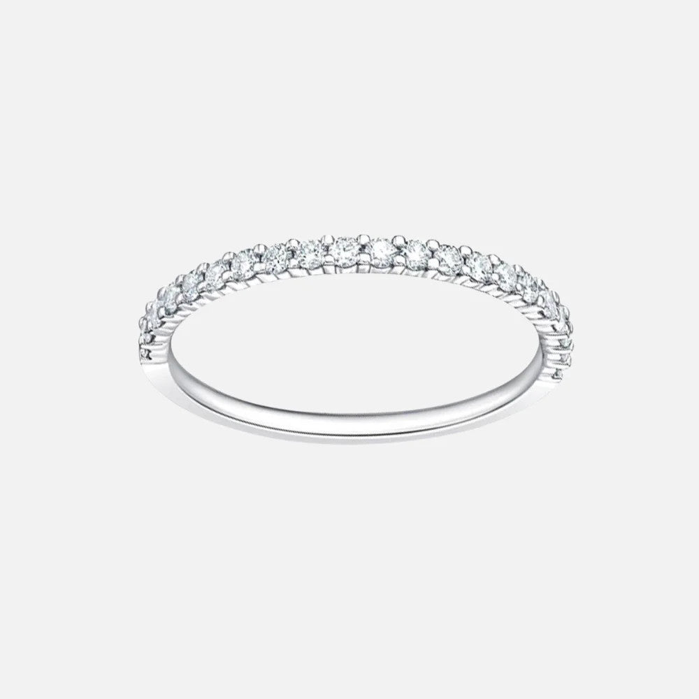 This platinum band features a delicate design with 21 round diamonds set in petite prongs.