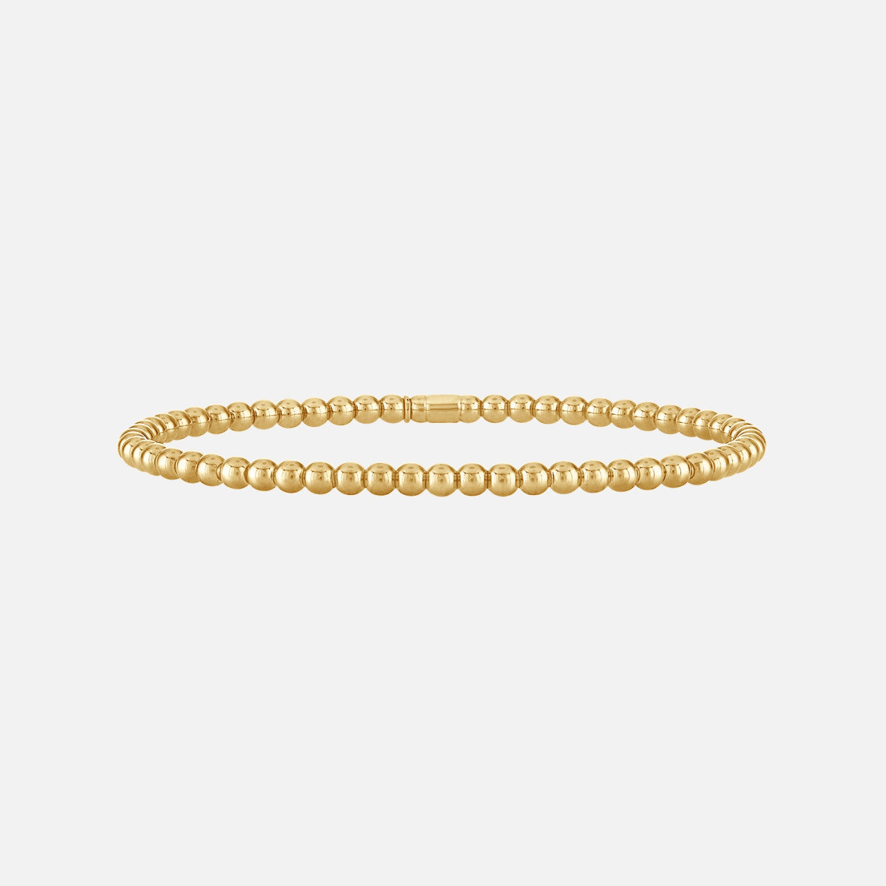 A yellow gold beaded stretch bracelet from Hulchi Belluni